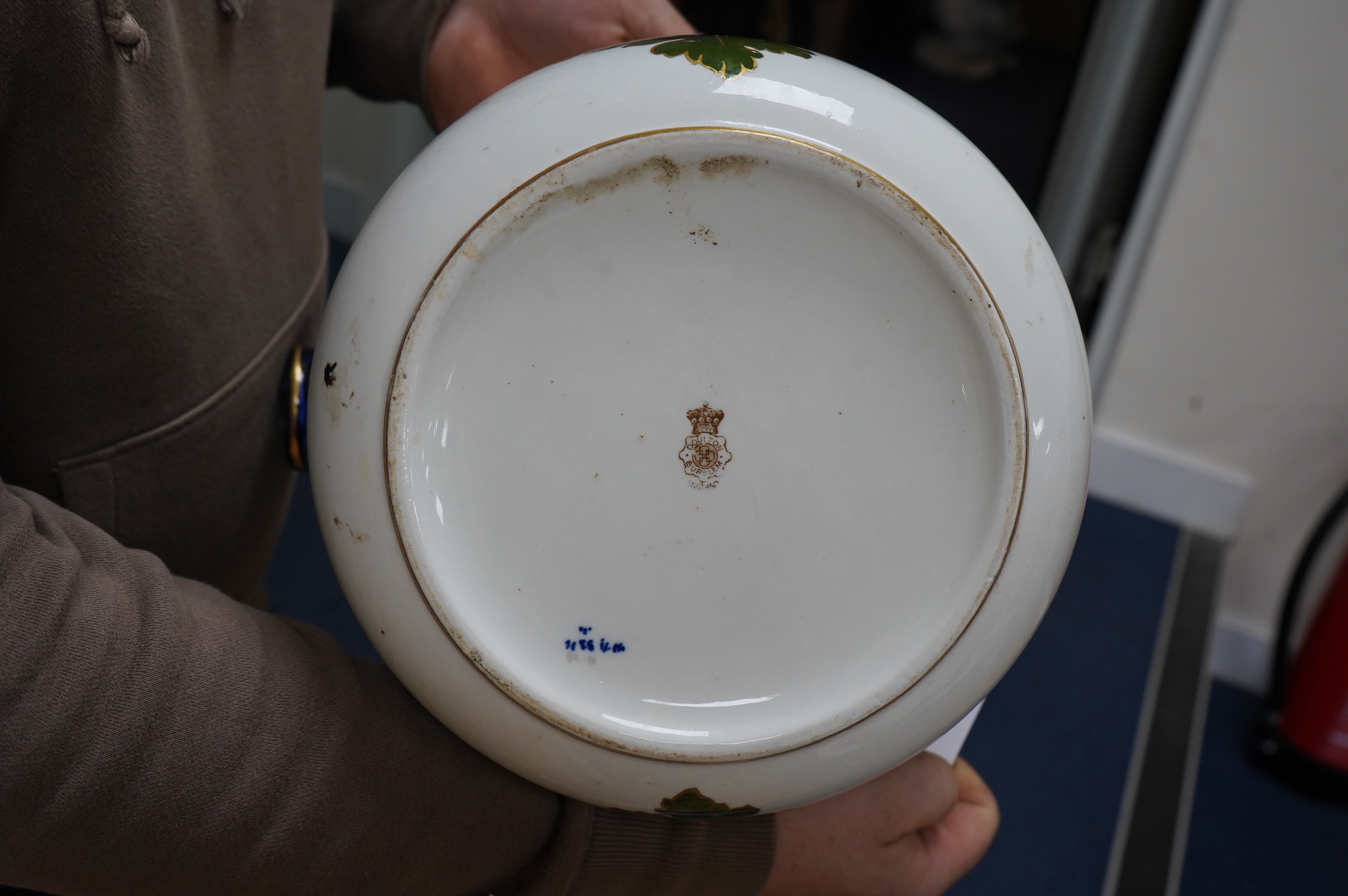 A Victorian Royal Doulton gilt and floral decorated pail, 28cm high. Condition - poor, crack to back